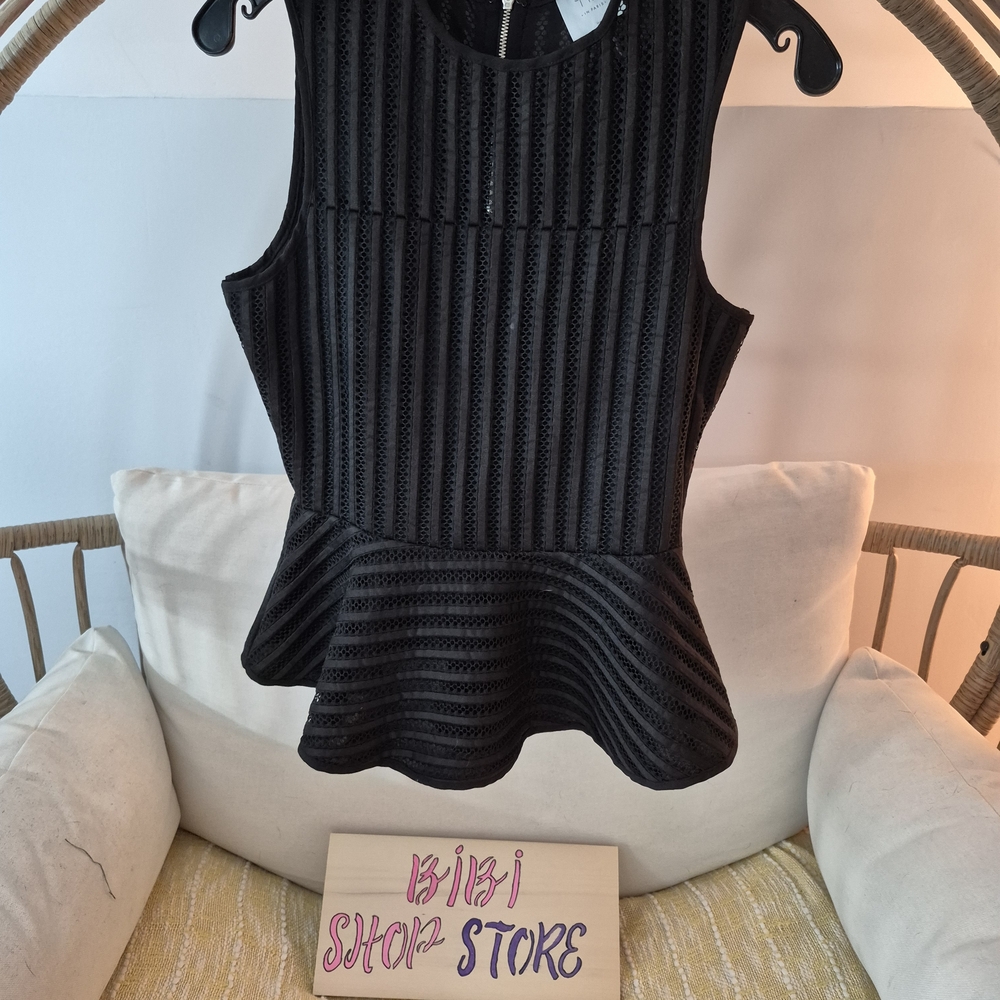 HD in Paris Black Textured Peplum Tank Top. Anthropologie Mesh Peplum Tank